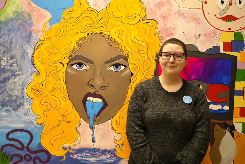 Anxiety and a lack of confidence once saw Kim Hamlyn, 22, pull back from life. That has changed since becoming involved with Choices for Youth employment based programming. She now expresses herself in art, such as painting the huge face seen in the mural on a wall at Choices for Youth, and learned business and life-management skills.