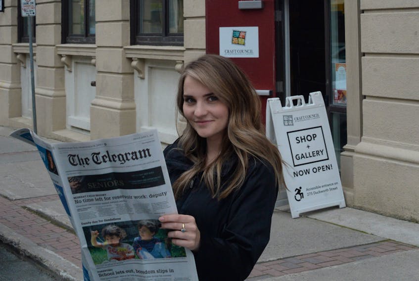 Rachel Green, archival researcher and oral historian with the Craft Council/Heritage NL, in front of the former home of the The Evening Telegram on Duckworth Street in downtown St. John’s. The building is now home to the Craft Council of Newfoundland and Labrador.