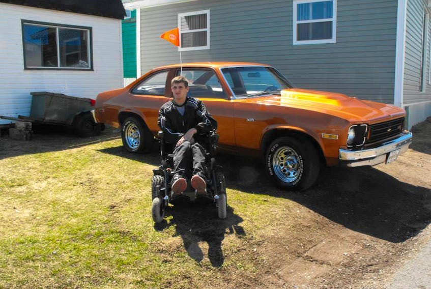 Jason Nolan poses in front of his family’s Chevrolet Nova. Nolan is passionate about everything car-related and says he can’t wait to be Andrew Warren’s navigator for Targa Bambina this summer.