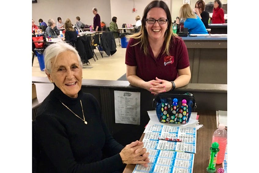Frankie Murphy (left) of St. John’s has been going to Cowan Plaza Bingo for more than 20 years. Manager Lorelei Best said she is one of many regular customers who still love to come out to play the game.