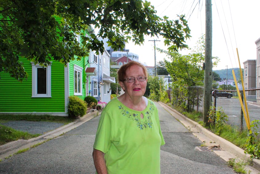 Joan Fowler, 84, who has lived in the Quidi Vidi Road area of St. John’s all her life, is outraged about a proposal to rezone an area in her neighbourhood — located at the former St. Joseph’s School, now an apartment building (at right in the photo) — to apartment medium density, which would allow more commercial development.
