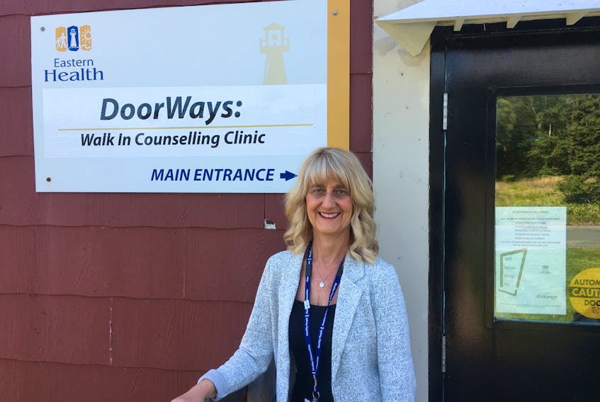 Tracy Sullivan, program manager with Doorways, stands before the entrance to the counselling clinic at 80 Charter Ave. in St. John’s.