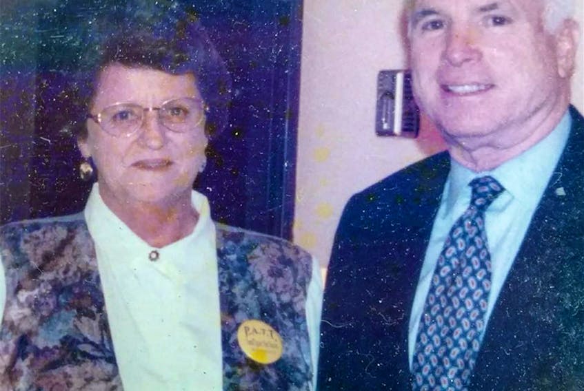 Daphne Izer, originally from Sunnyside, with Senator John McCain at his office on Capitol Hill in Washington some years ago.