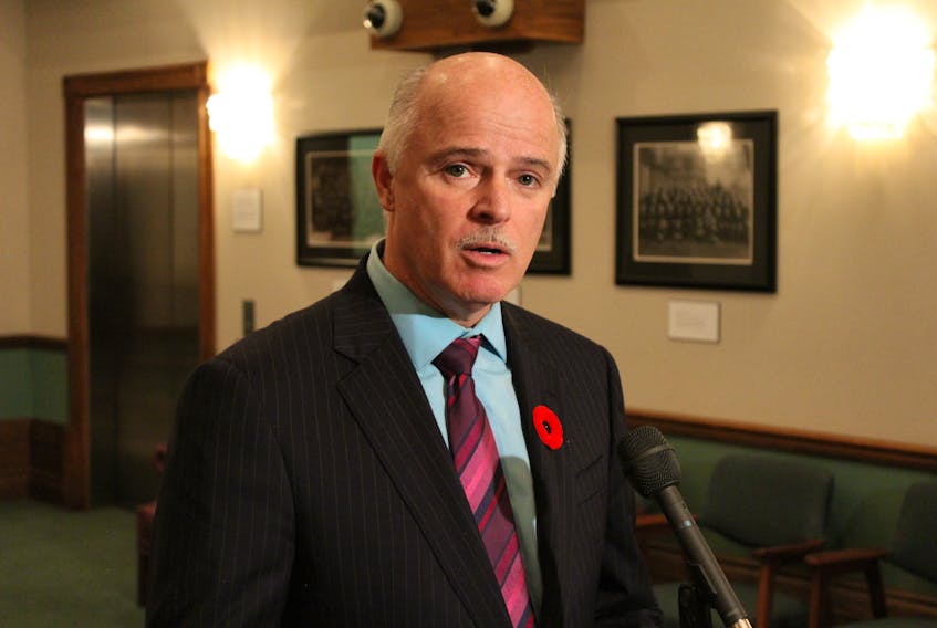 Finance Minister Tom Osborne says oil prices are up, but production was down at the halfway mark of the fiscal year.