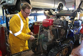 Andy Young is a popular man these days. A pair of snowstorms — likely not to be the last this winter — has kept him busy repairing snowblowers in the St. John’s metro area. Thursday, he was preparing to fix a transmission issue on this machine at his shop at King’s Bridge Service Station.