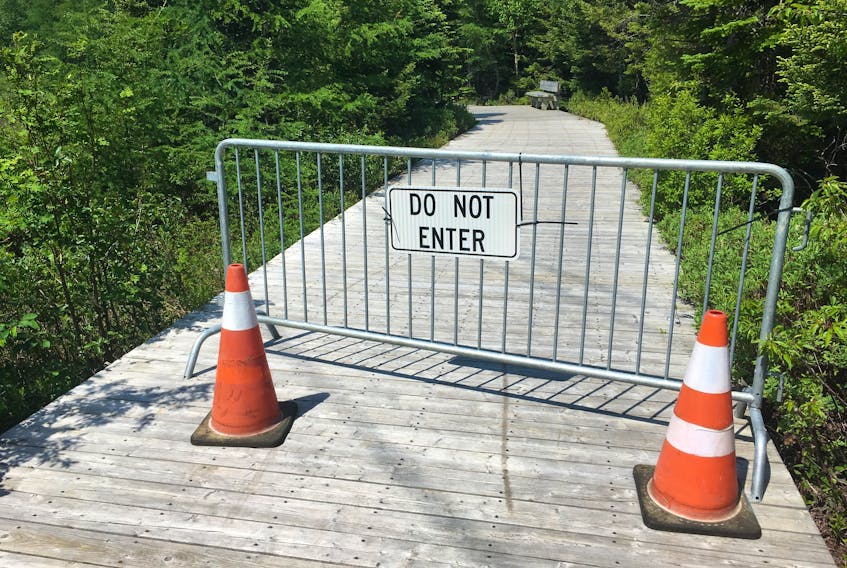 The Power’s Pond walking trail boardwalk remains closed off as environmental clean-up continues in Mount Pearl.