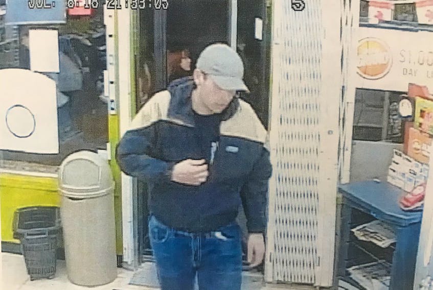 Police allege the robbery suspect seen in this photo captured by surveillance cameras is Jeffrey Earle.