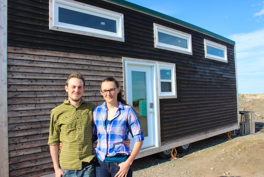 Tim Ward and Jess Puddister show off their tiny home as they await Pouch Cove town council’s decision.
