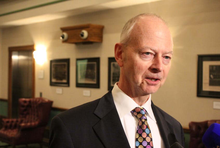Tory Leader Ches Crosbie speaks to reporters Monday outside the House of Assembly.