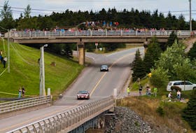 Cars race under a bridge in Marystown during the Targa Newfoundland road rally. This year’s race will take place predominately on the Burin Peninsula. -
Photo by Newfoundland International Motorsports Ltd.