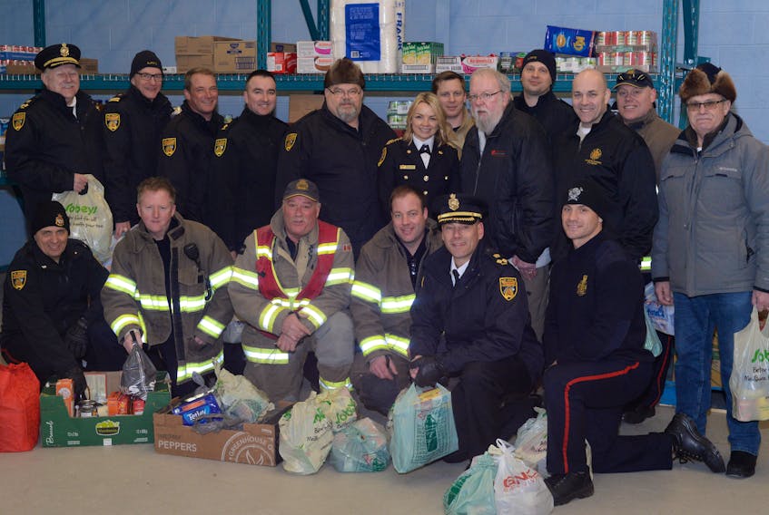 Firefighters with the St. John’s Regional Fire Department (SJRFD) gave back to the Community Food Sharing Association by holding a food drive at all eight of their fire stations on Sunday.