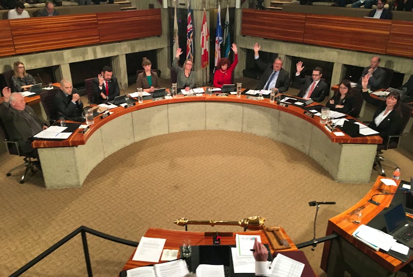 From left, council members Wally Collins, Ian Froude, Jamie Korab, Hope Jamieson, Deanne Stapleton, Debbie Hanlon, Sandy Hickman, Dave Lane, Maggie Burton, Sheilagh O’Leary, and Mayor Danny Breen (bottom) vote on the 2018 St. John’s budget.