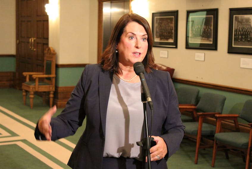 Natural Resources Minister Siobhan Coady speaks to reporters Tuesday.