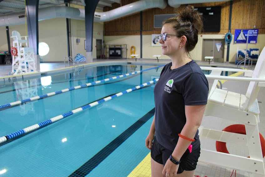 Lifeguard/instructor Nicole Tilley prepares for the arrival of swimmers at the pool in the Conception Bay South Recreation Complex on Thursday morning. The pool reopened this week after an extended maintenance period.