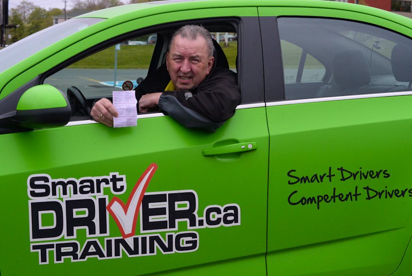 Paul Prowse, owner-operator of SmartDRIVER Training, says driving school vehicles are among the safest on the road and should not be subject to insurance rates in the high-risk category.