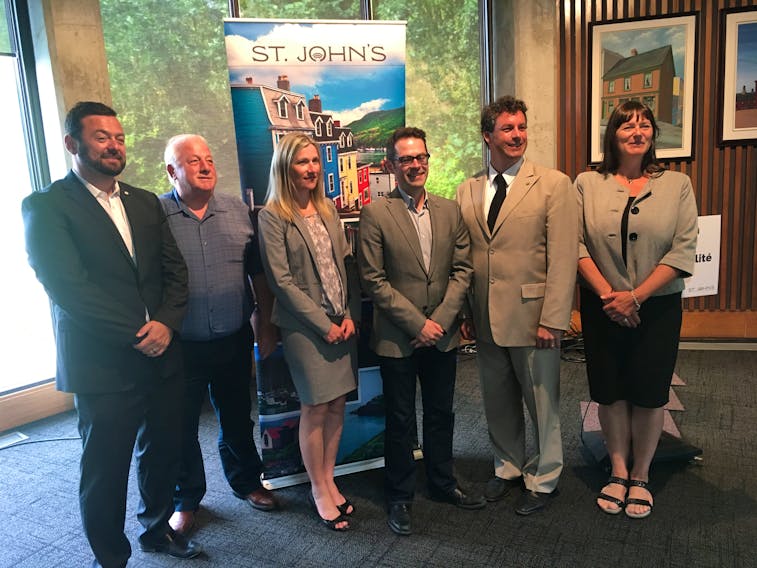 (From left) left to right: Coun. Jamie Korab, Coun. Wally Collins, Metrobus manager Judy Powell, Coun. Dave Lane, MP Nick Whalen, Deputy Mayor Sheilagh O’Leary were on hand for Monday’s funding announcement which will lead to upgrades for the Metrobus service.