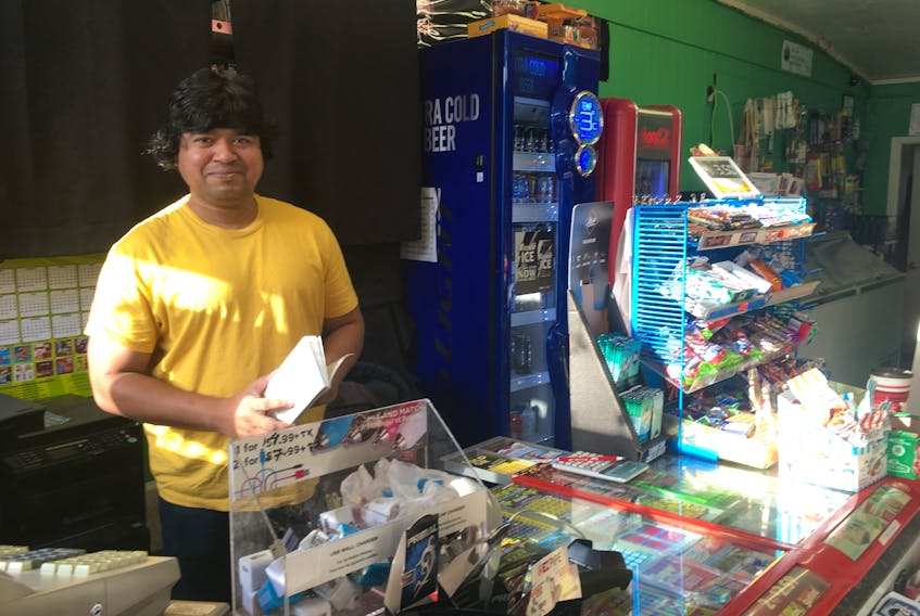 Subhendu Paul is back to work at Shalimar Convenience after being attacked with bear spray by an armed robber Friday night.