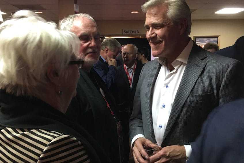 Premier Dwight Ball chats with people who attended the Liberal convention in Gander over the weekend.