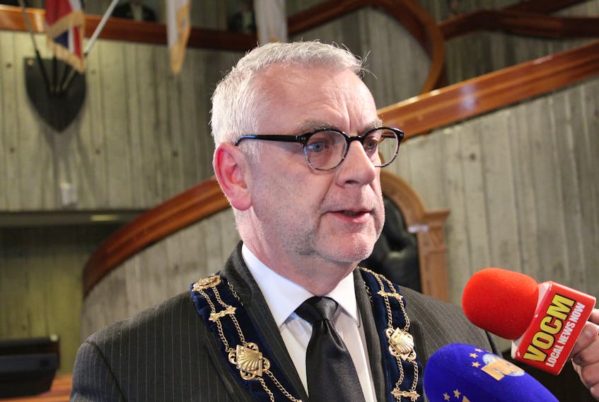 St. John’s Mayor Danny Breen speaks to reporters after the regular Monday council meeting, during which council voted to waive downtown development fees.