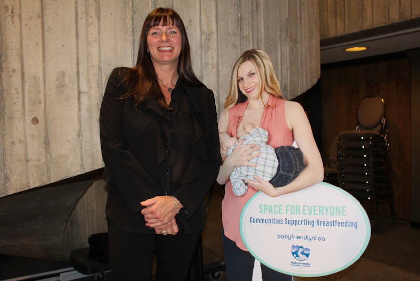 Deputy Mayor Sheilagh O’Leary stands next to a life-size cutout in council chambers provided by Baby-Friendly Newfoundland and Labrador, a group committed to increasing breastfeeding in the province.