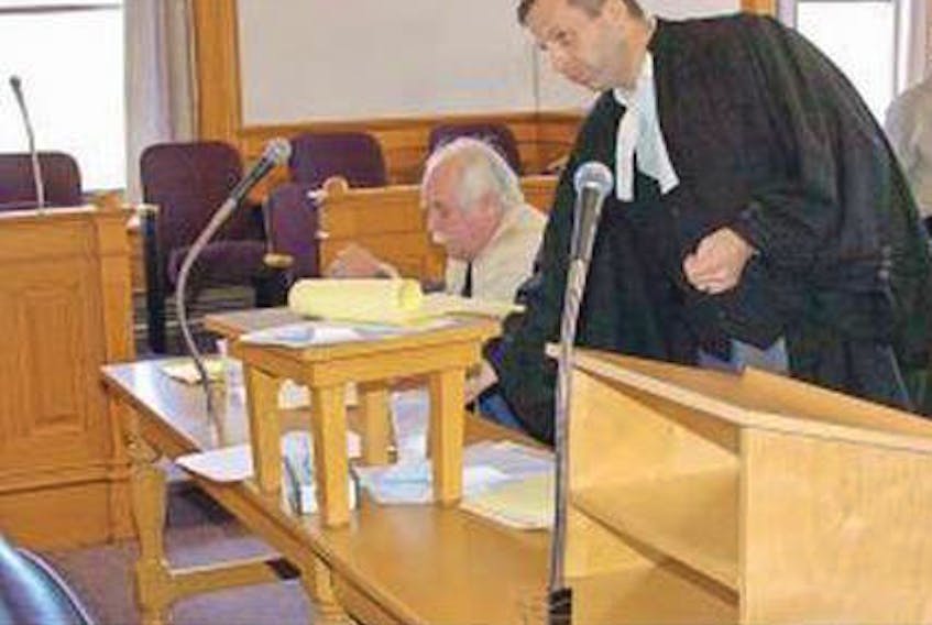 Reginald Joseph O’Keefe (left) in Newfoundland Supreme Court in St. John’s in May 2016.