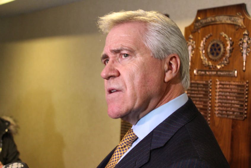 Premier Dwight Ball speaks to reporters Tuesday at the Holiday Inn in St. John’s.