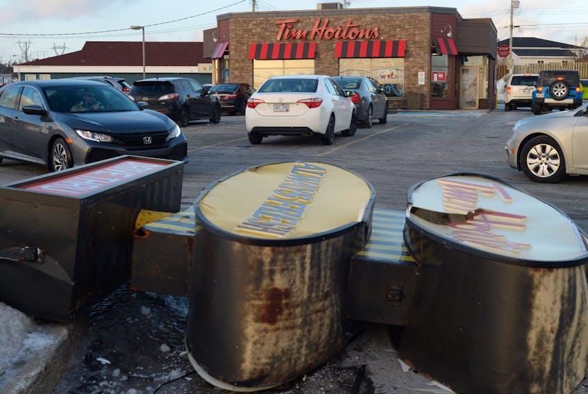 A Tim Hortons sign at the Paradise outlet was knocked over by high winds on Boxing Day.