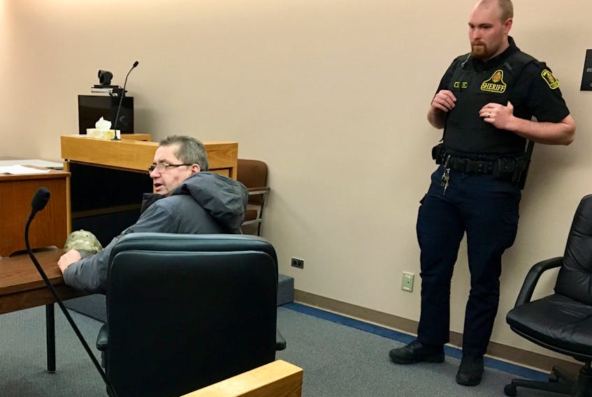 John (Jack) Duff turned his back on reporters, trying to hide his face in the courtroom Tuesday morning, prior to the start of proceedings in provincial court in St. John’s. Duff received a suspended sentence and two months of probation for stabbing his cat, Oreo, to death in 2018.