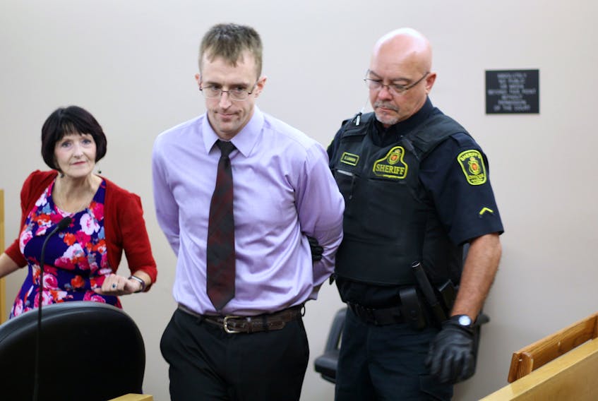 Thomas Keeping (centre) prepares to go back to the holding cells at provincial court in St. John's, having just been sentenced to 3 ½ years behind bars for a stabbing and other crimes. Keeping stabbed a man on Outerbridge Road in the west end of the city last November.