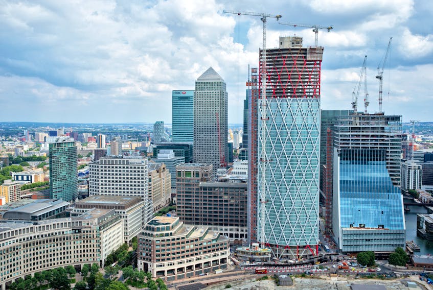 The “Newfoundland,” a residential building currently under construction at the western end of the massive Canary Wharf estate, close to the River Thames, in London, England, is set to open in December. — Newfoundland, Canary Wharf, photo