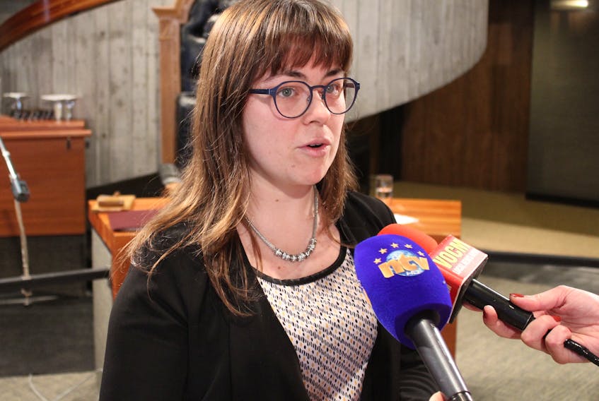 Coun. Maggie Burton speaks to reporters Monday at St. John’s City Hall.