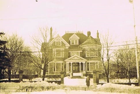 War-time headquarters for Canadian Army in St. John’s was Winterholme, an outstanding Queen Anne-style mansion built in 1905. Note the armed guard at the gate in this 1942 photograph. — Photo courtesy of Dick Cook