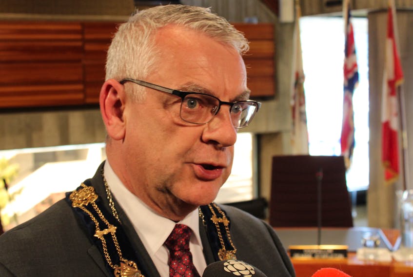 St. John’s Mayor Danny Breen speaks to reporters Monday at city hall.