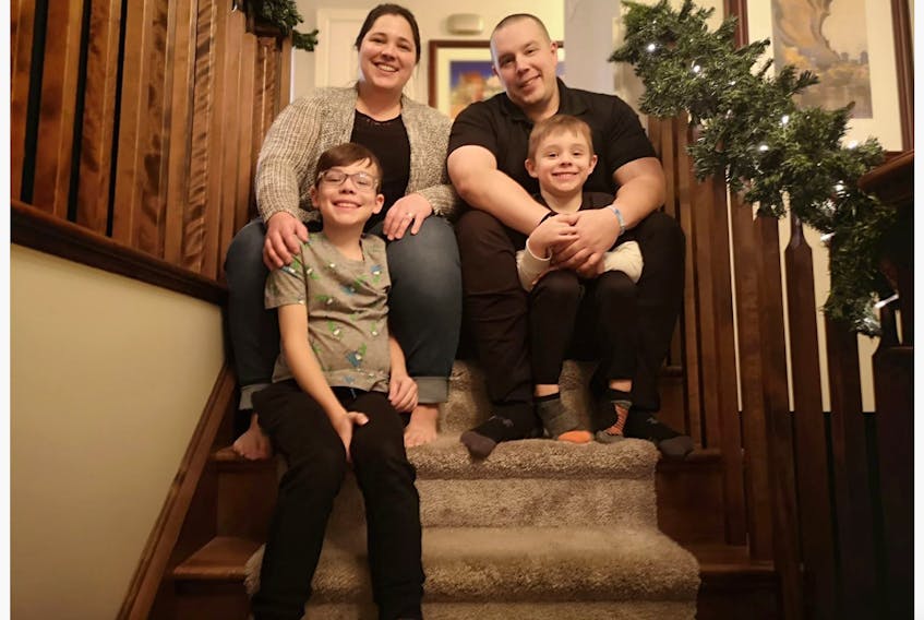 Gillian and John Bennett Sr., with Noah (left) and John Jr. The Bennetts found out their son, John, had cystic fibrosis when he was 2 1/2 months old. A new drug, which isn’t yet available in Canada, could potentially lengthen his life expectancy.