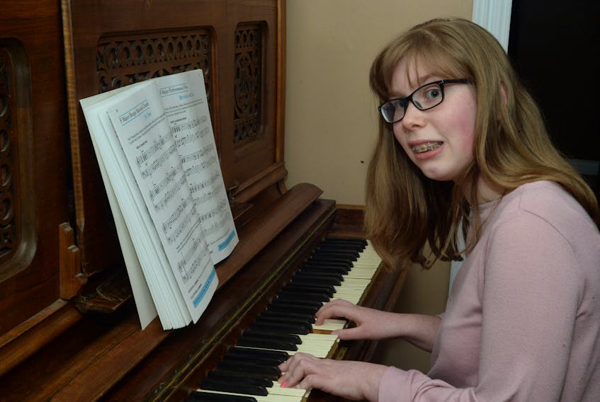 Amanda Tobin at the piano at her home in St. John's.