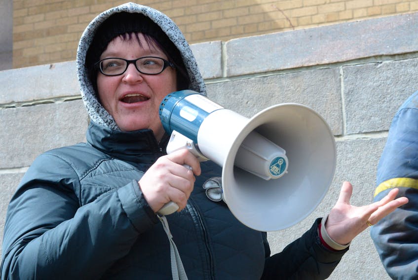 Fish harvester Tammy Elliott of Gambo addresses about 200 FISH-NL supporters at a rally at the Confederation Building on Friday afternoon.