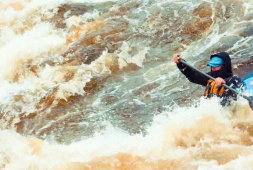 Jeff Martin is shown going over a big drop in the Terra Nova River known as Jim’s Drop. The gruelling trip was documented in “Rising Waters”, which will be screened this Saturday at Hampton Hall Theatre.