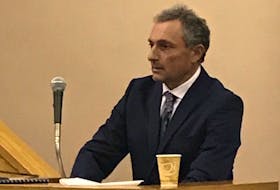 Dr. Nash Denic, a forensic pathologist who will soon take over as the province’s chief medical examiner, prepares to testify at the murder trial of Allan Potter Tuesday. Denic performed an autopsy on Dale Porter in the days after his death.