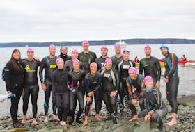 Sixteen swimmers braved The Tickle to raise money for mental health initiatives Saturday.