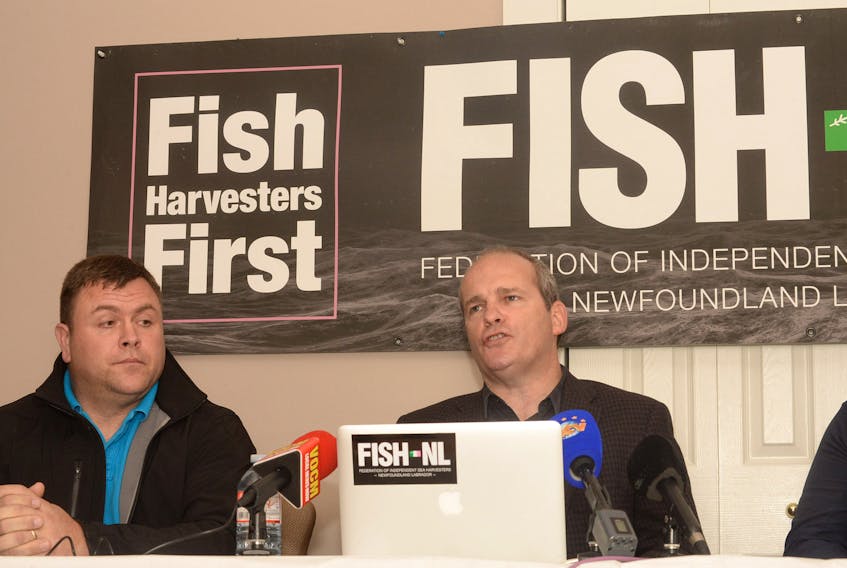 FISH-NL president Ryan Cleary speaks Thursday morning during a news conference held by FISH-NL at its downtown St. John’s office, while FISH-NL vice-president Richard Gillett of Twillingate looks on.