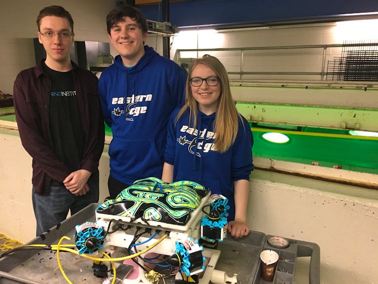 The Eastern Edge Robotics team, consisting of 20 students from Memorial University and the Marine Institute, are in Washington state for the start of the 2018 Marine Advanced Technology Education international ROV competition. Shown are team members (from left) Christian Samson, Stephen Chislett and Michaela Barnes with their remotely operated vehicle Florizel, or Flo for short.