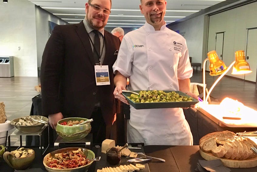 Centerplate general manager Rejean Roch (left) and executive chef Jeremy McKinnon display one of the many dishes that were provided at the St. John’s Convention Centre Thursday at the launch of Centerplate being named SJCC’s exclusive food and beverage provider.