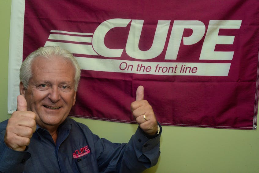 Canadian Union of Public Employees Newfoundland and Labrador division president Wayne Lucas, 64, gives the thumbs-up for retirement at his St. John’s CUPE N.L. office on Friday afternoon before “going for a retirement beer.”