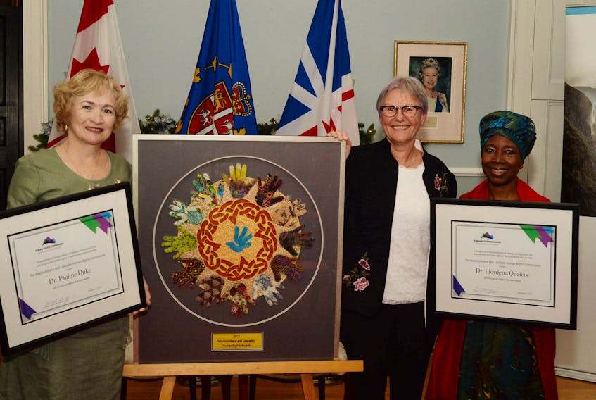 Pictured with their achievement awards following a ceremony at Government House Thursday for the 2017 Human Rights Awards are:  (from left) Dr. Pauline Duke, Susan Rose and Lloydetta Quaicoe. Rose was the winner of the award and Duke and Quaicoe were named human rights champions.