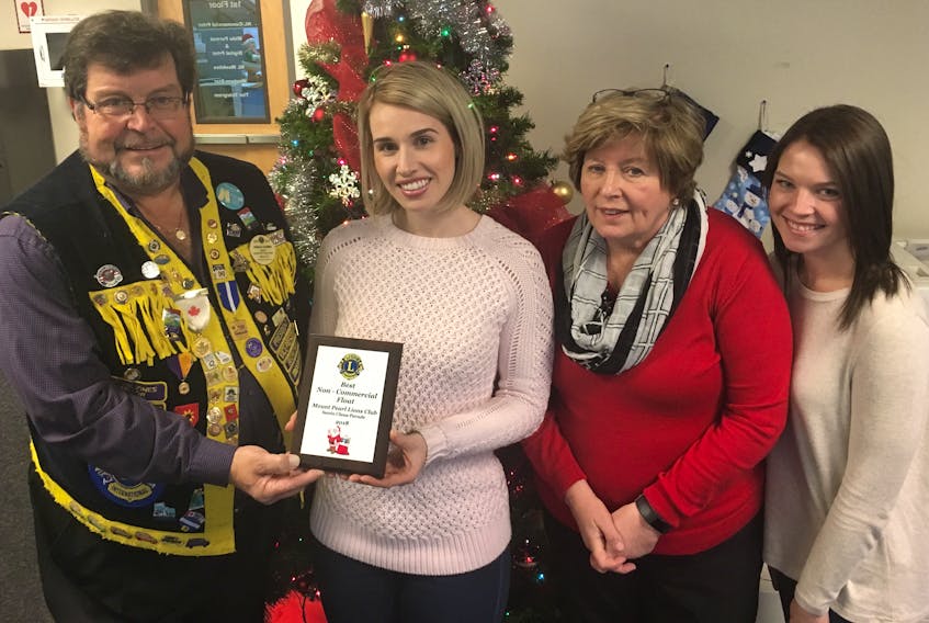 Pictured (from left) are Lions club parade chair Gerald Coombs; Angela Picco, Choices for Youth fund development and communications co-ordinator; Carol Wadden, Telegram Newspaper in Education co-ordinator; and Miranda Antle, Choices for Youth fund development officer.