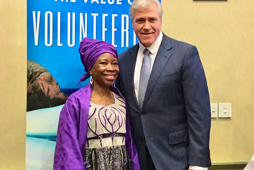 Lloydetta Quaicoe, named co-chair of the province’s Volunteer Week, poses with Premier Dwight Ball at the Community Sector Council’s annual volunteer luncheon at Holiday Inn in St. John’s Wednesday.