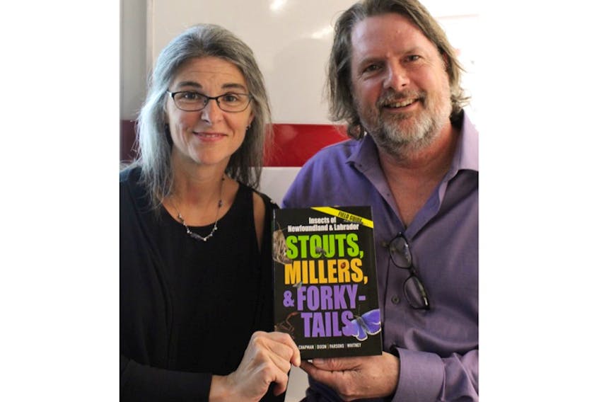 Carolyn Parsons (left) and Tom Chapman sit outside a coffee shop in the Avalon Mall with Boulder Books’ newest field guide, “Stouts, Millers and Forky-Tails: Insects of Newfoundland and Labrador,” which they co-wrote with Peggy Dixon and Hugh Whitney.