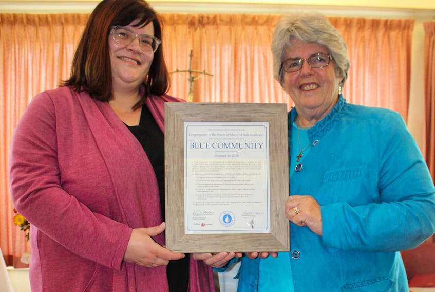 Andrea Furlong, the interim executive director of the Council of Canadians presented a charter to Sisters of Mercy representative Sister Diane Smyth during a ceremony at McAuley Convent in St. John’s Friday making the organization a Blue Community. The designation denotes the Sisters recognize that water is a shared resource for all.