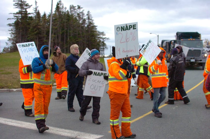 The Paradise town council has locked out its unionized employees, who had approved a strike in a vote. Workers picketed outside the town hall and depot Monday.