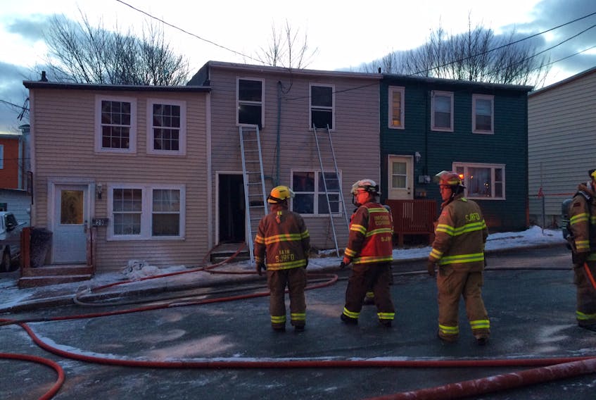 Firefighters are shown at the scene of a fire on Goodview Street in downtown St. John's.